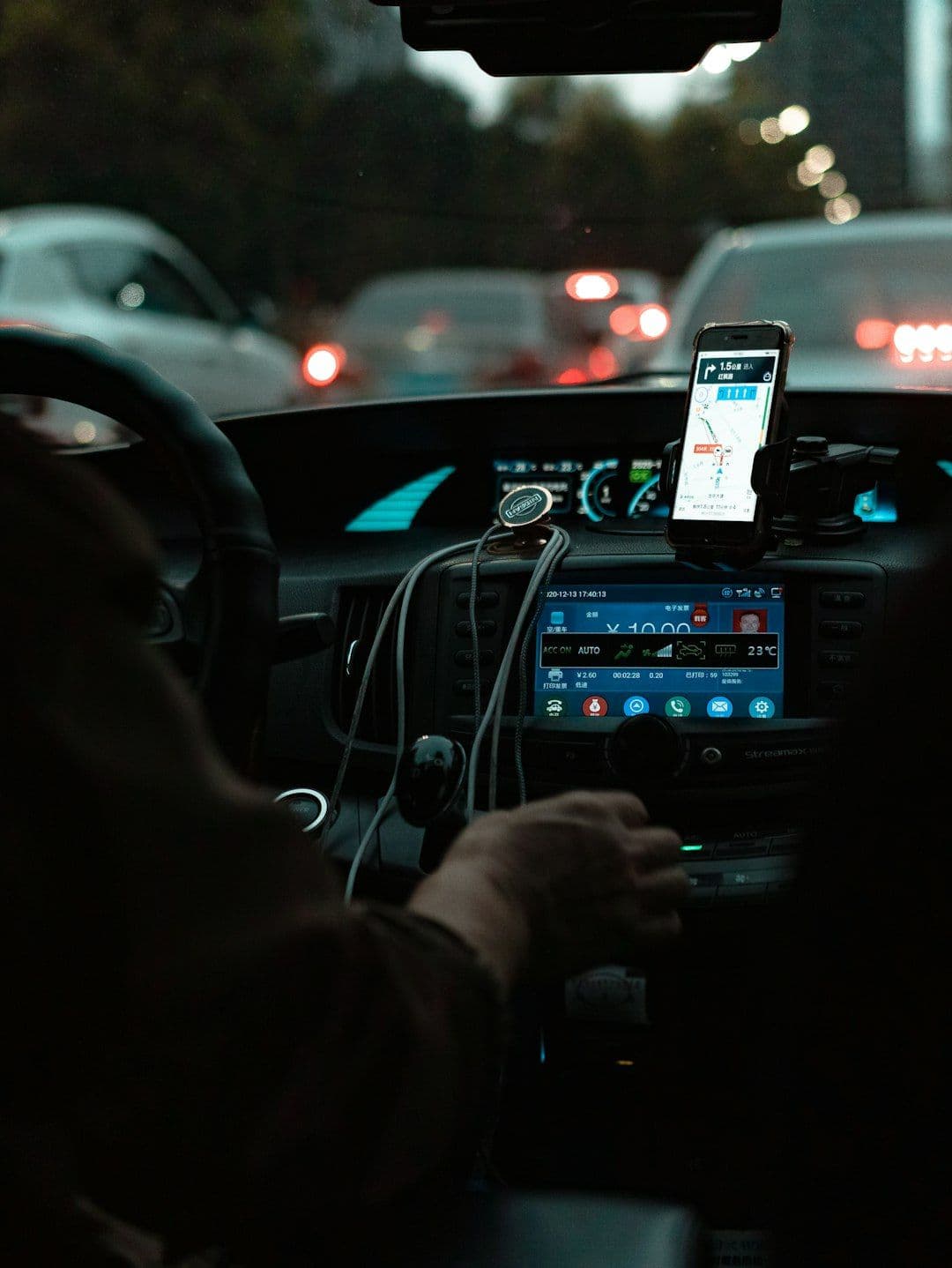Smartphone displaying custom ride-hailing app development