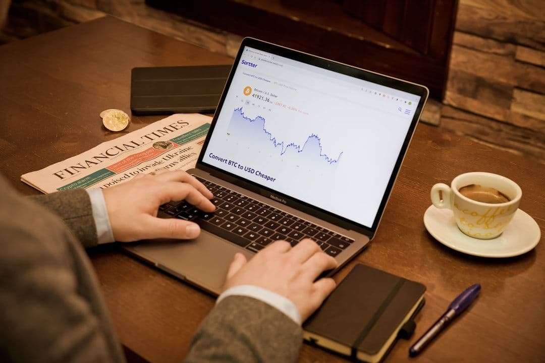 Hands of analysts working on predictive tools for business insights.