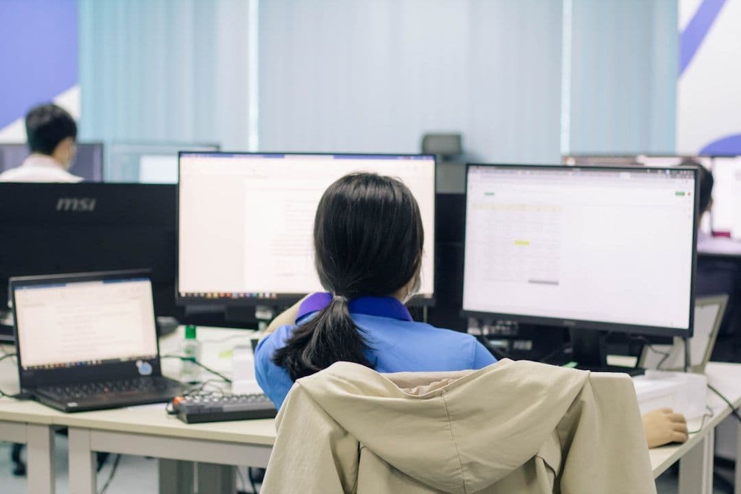 Person using a custom CRM system to manage cases and improve response times