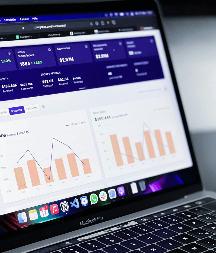 Enterprise software design illustration with laptop displaying analytics dashboard, representing intuitive UI/UX design for enterprise applications focused on usability and performance.