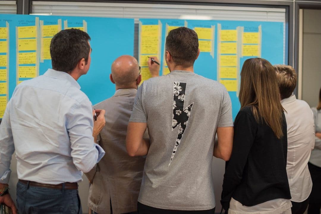 Group of executives analyzing customer lifetime value insights.