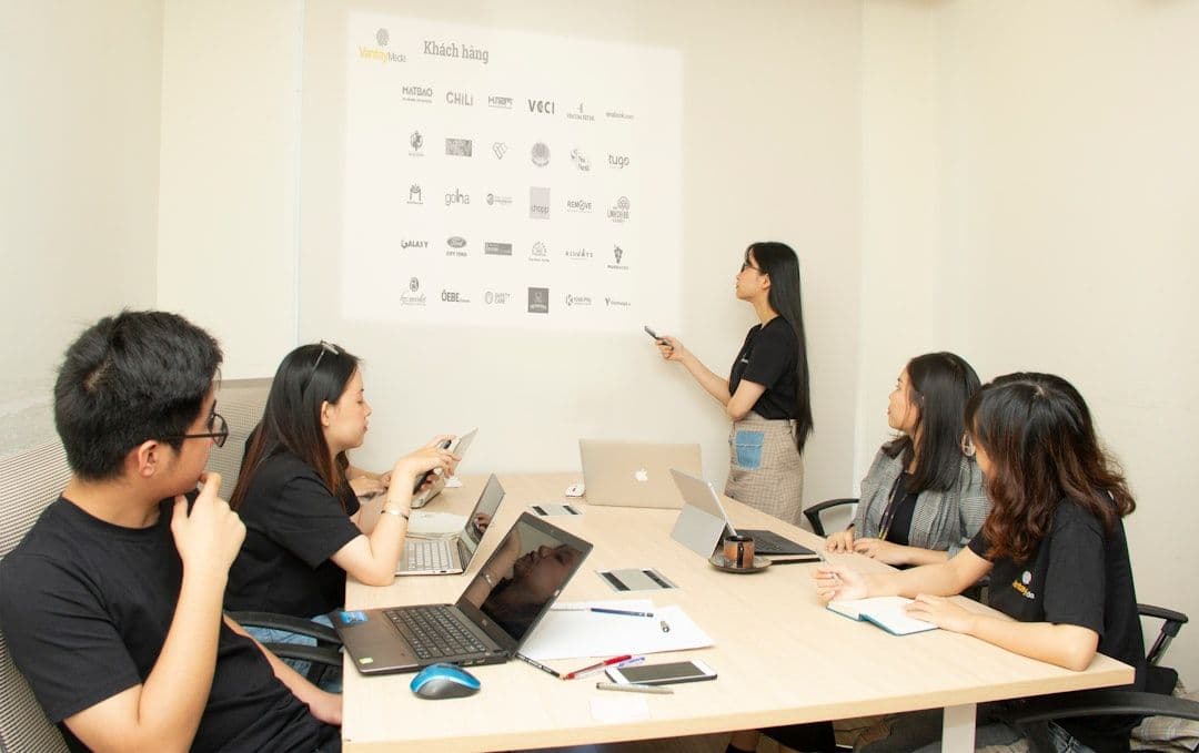 Corporate learning teams collaborating on upskilling employees