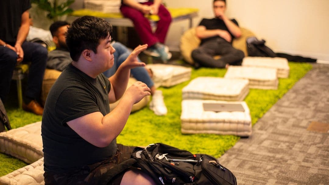 Indie gaming team discussing scalable infrastructure