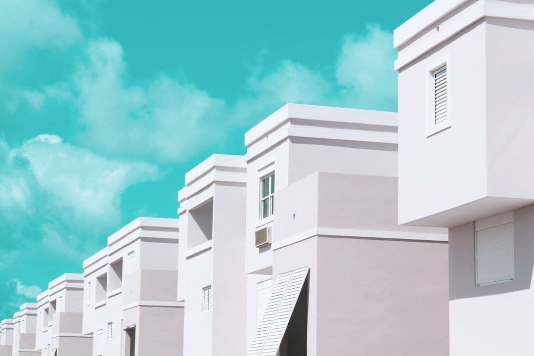 Modern real estate website design with search bar and property listings